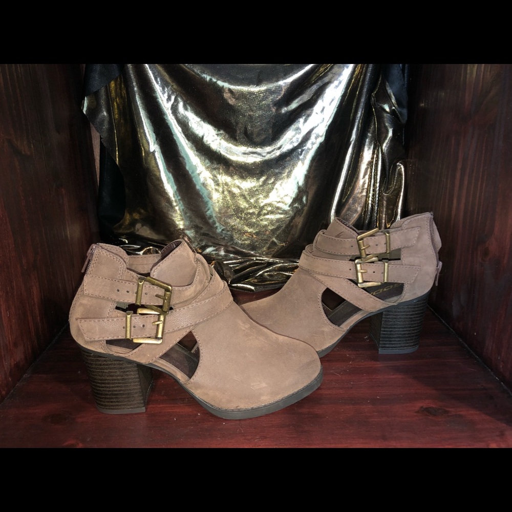 Ankle boots with gold buckle